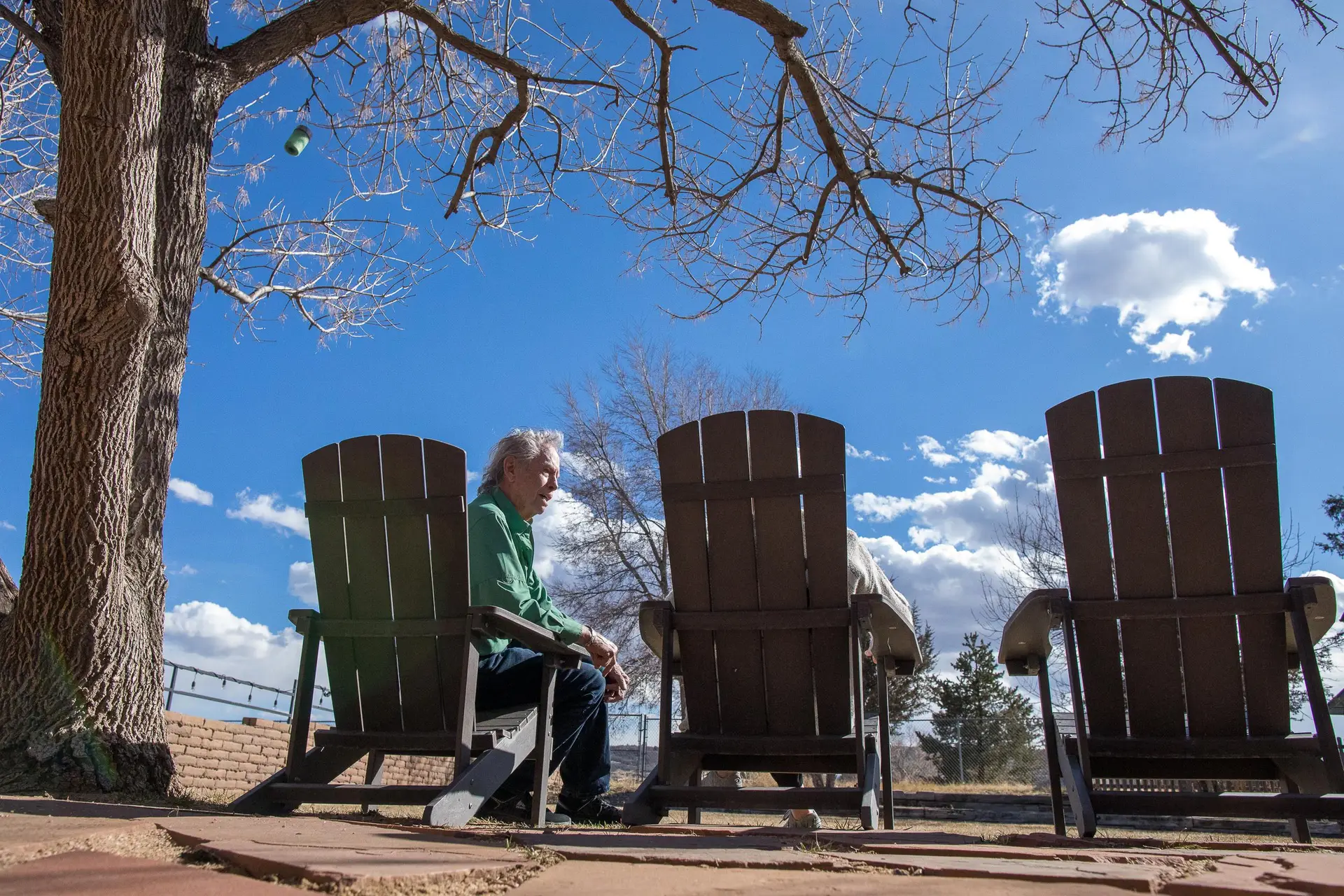 Haven Home residents sit out on the patio.